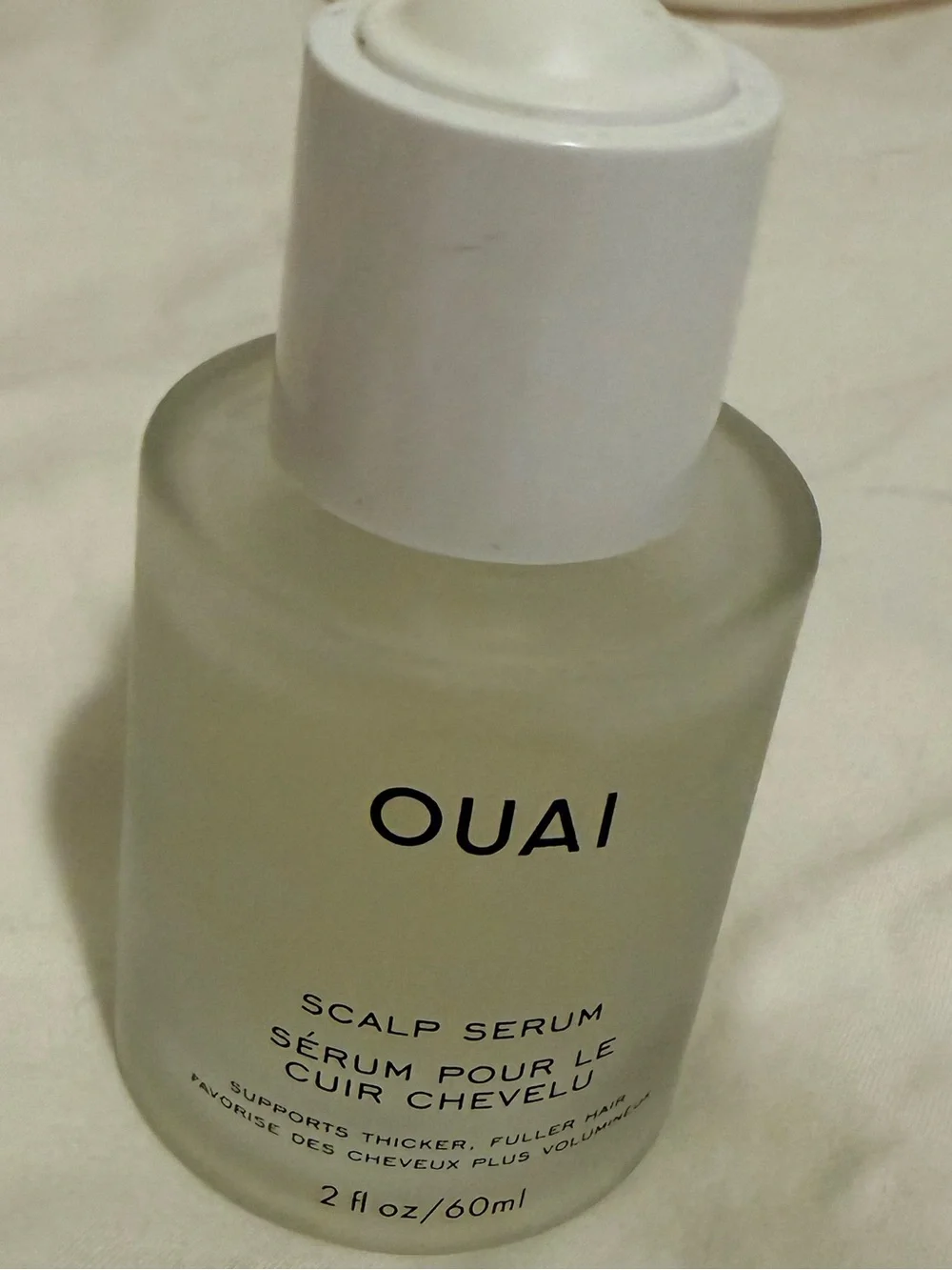 OUAI White Serum Bottle with Frosted Glass and White Cap